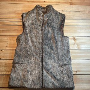 Marisa Minicucci Vest.